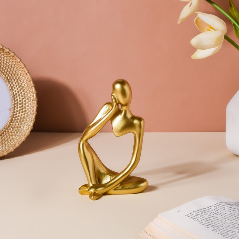 Gold Sitting Showpiece
