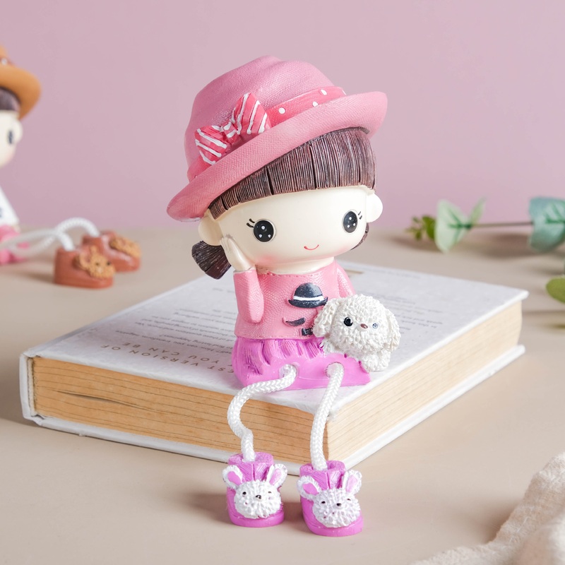 Cowgirl Resin Showpiece With Hanging Legs