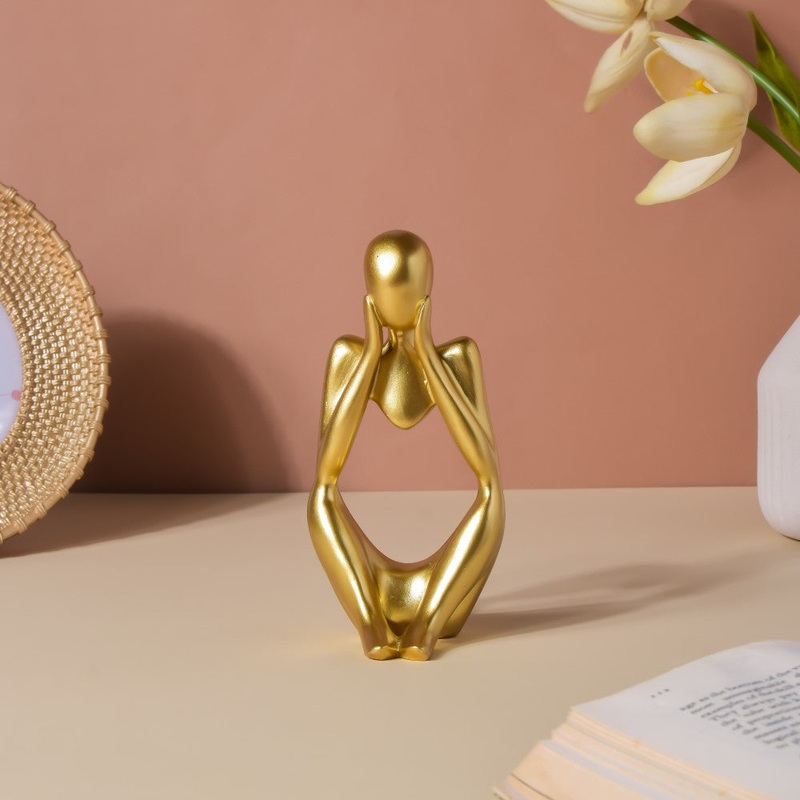 Gold Sitting Showpiece In Thought